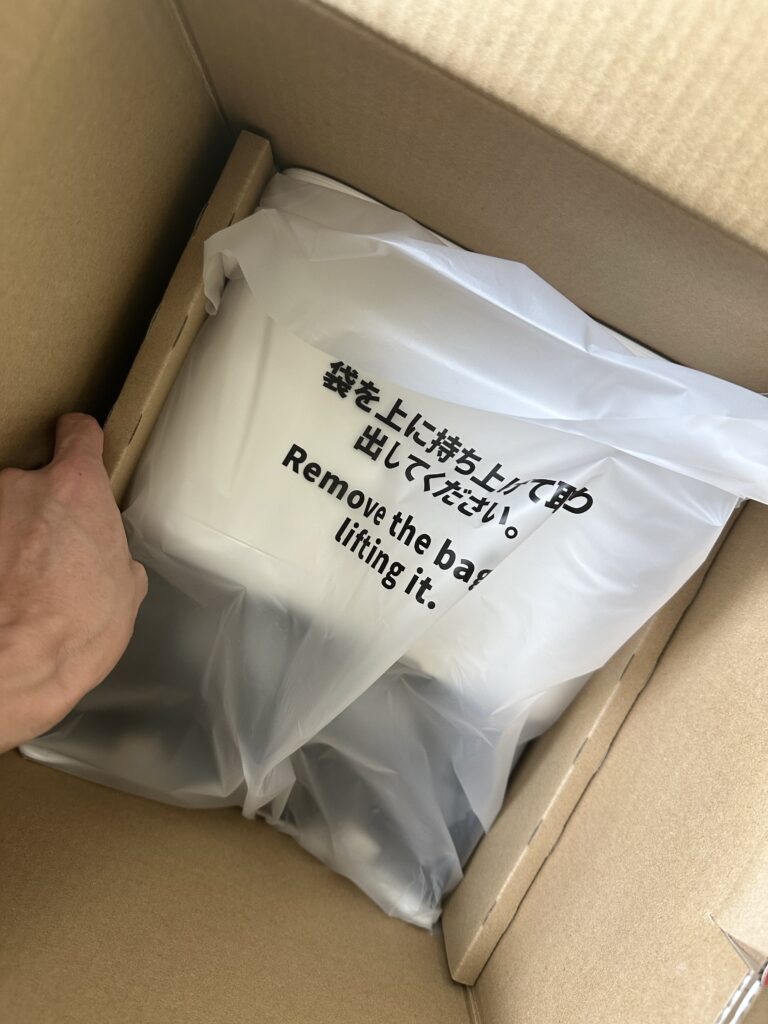 袋じゃなくて左右を引き上げる